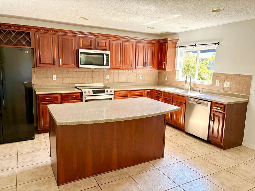 Photo of 10812 Tilston Point, Orlando, FL 32832 (MLS # GC537070)