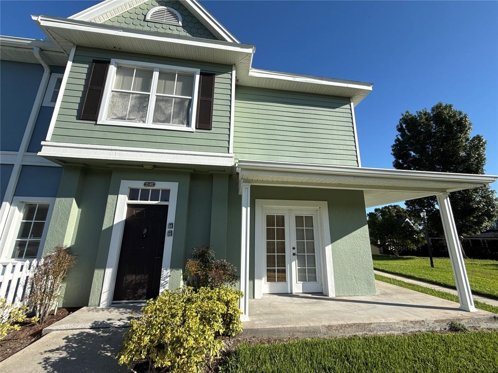 Photo of 2201 San Vittorino Circle #102, Kissimmee, FL 34741 (MLS # O6442172)