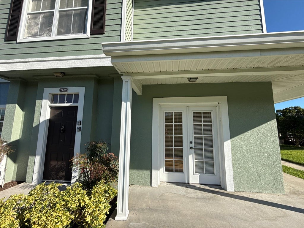 Photo of 2201 San Vittorino Circle #102, Kissimmee, FL 34741 (MLS # O6442172)