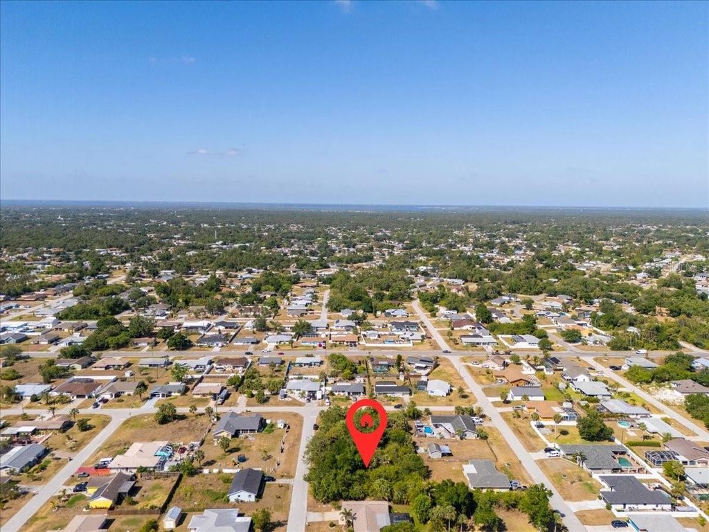 Photo of 868 Mensh Terrace NW, Port Charlotte, FL 33948 (MLS # C7509314)