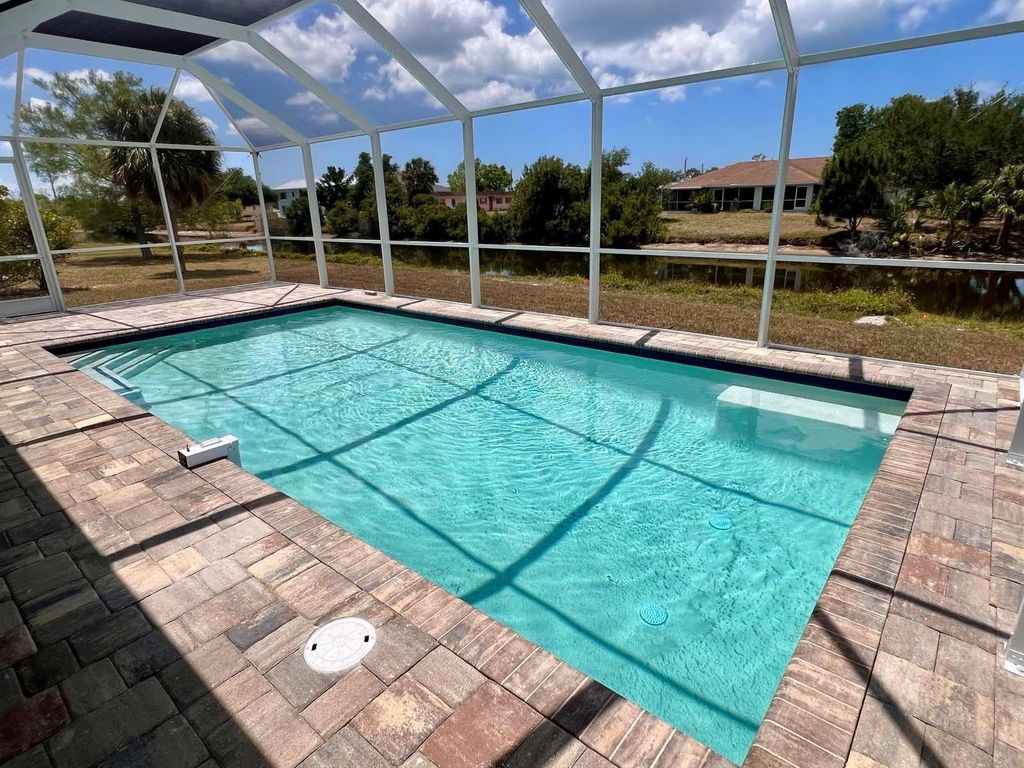 Photo of 55 Rotonda Circle, Rotonda West, FL 33947 (MLS # N6144131)