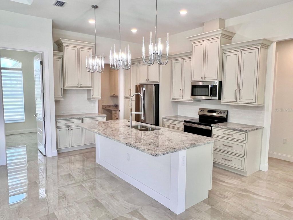 Photo of 55 Rotonda Circle, Rotonda West, FL 33947 (MLS # N6144131)
