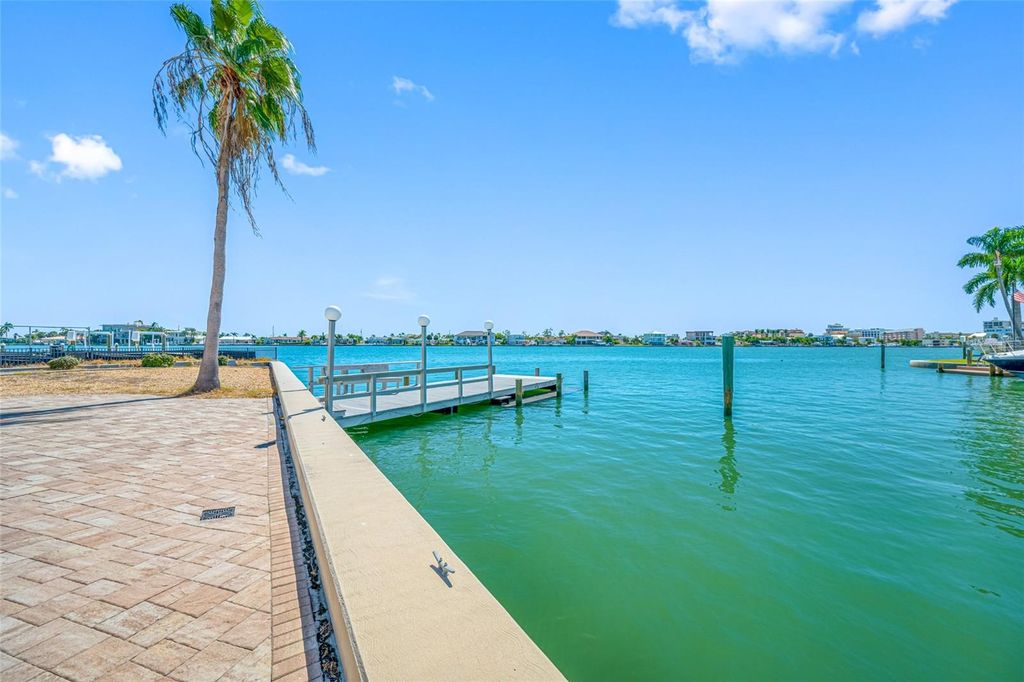 Photo of 5840 Bali Way S, St Pete Beach, FL 33706 (MLS # TB8437295)