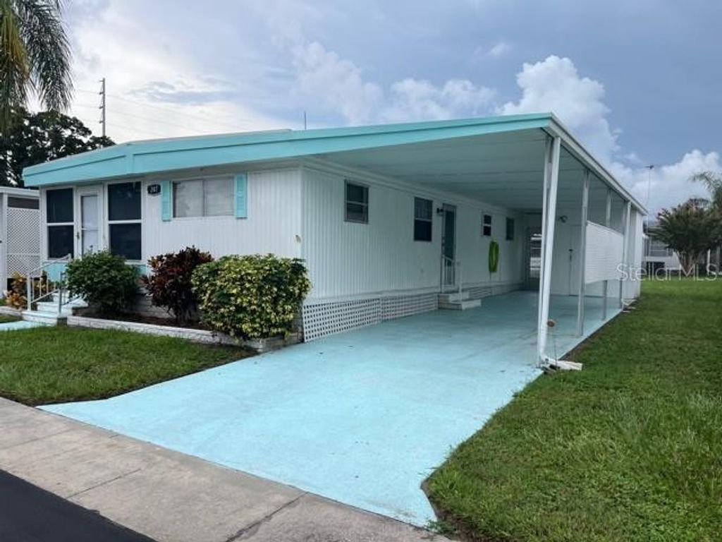 Photo of 1500 County Road 1 #247, Dunedin, FL 34698 (MLS # TB8425362)