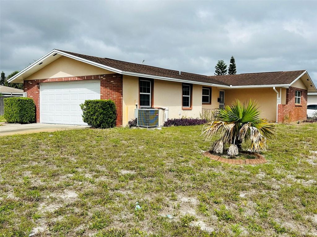 Photo of 10433 Laburnum Drive, Port Richey, FL 34668 (MLS # TB8438681)