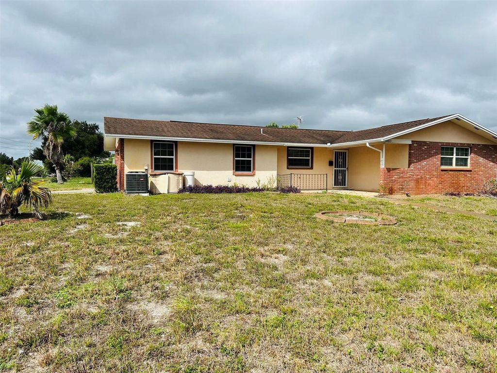 Photo of 10433 Laburnum Drive, Port Richey, FL 34668 (MLS # TB8438681)
