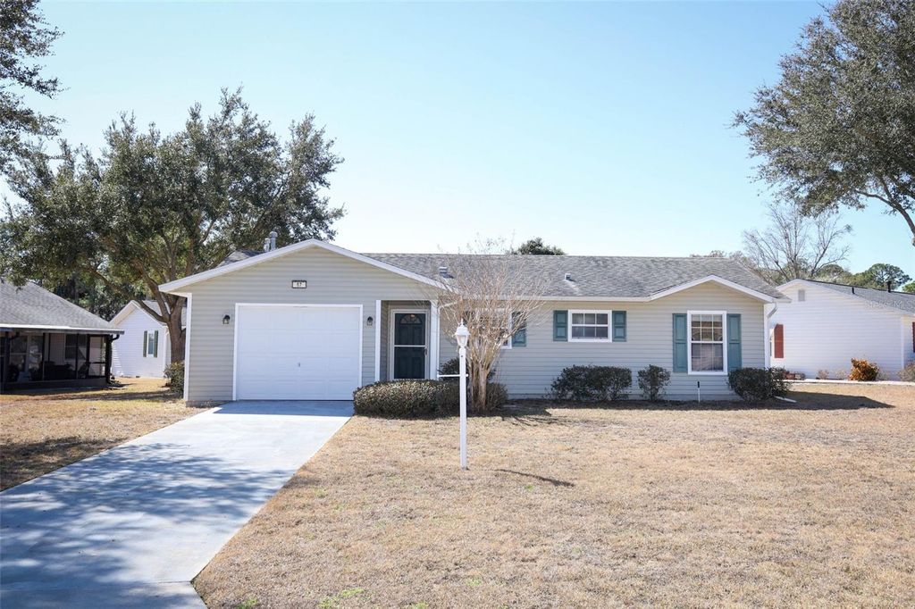 Photo of 67 Aberdeen Circle, Leesburg, FL 34788 (MLS # O6381733)