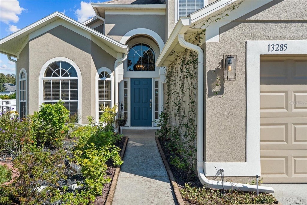 Photo of 13285 Early Frost Circle, Orlando, FL 32828 (MLS # O6454170)