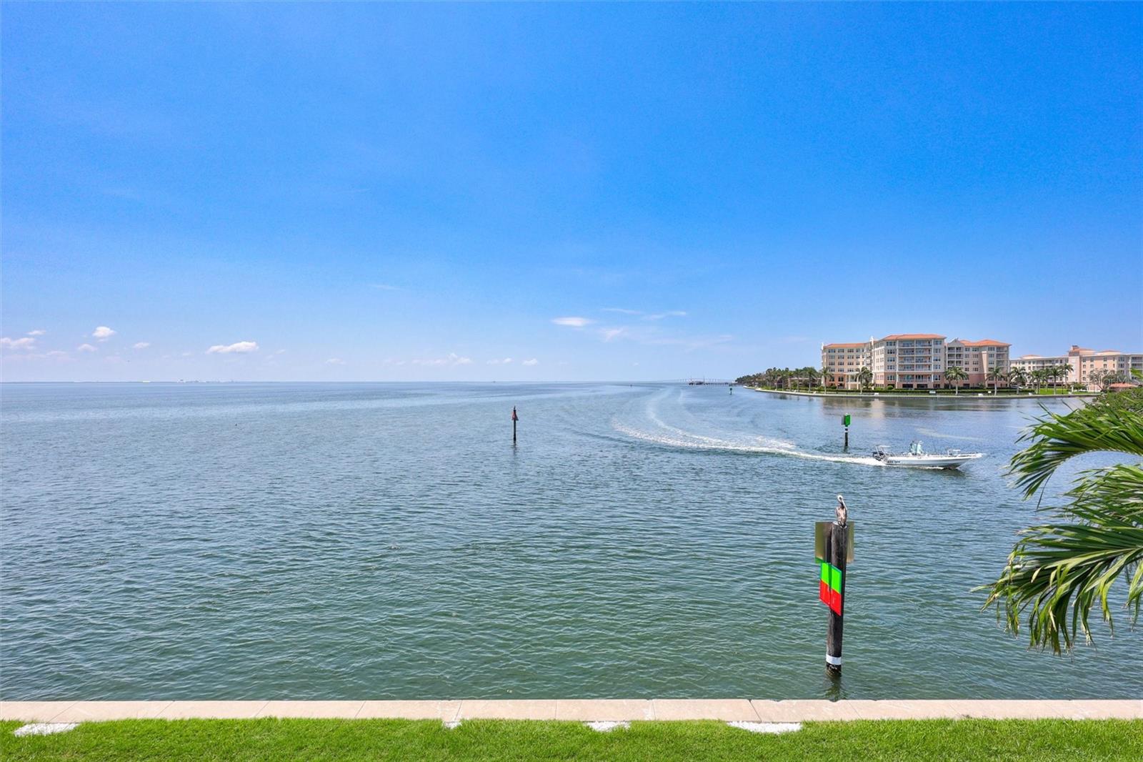 Live Every Day Like You’re on Vacation! Rare Find: This condo offers both sunrise and sunset views, along with stunning Skyway Bridge Views, Private Boat Lift & Investment-Ready Condo. Have you always dreamed of waking up in a place where every day feels like a resort getaway? This exquisite 2-bedroom, 1-bath condo offers just that—and more. This unit comes with its very own 13,000-pound boat lift, giving you direct access to both Tampa Bay and the Gulf for endless boating adventures. The lift can also be rented out to both Waterside North and South residents—and with a consistent wait list, it’s an added income opportunity. Even better, the condos in this community have shown strong rental income potential. Moreover, this condo presents a rare opportunity to own a home that blends personal enjoyment with substantial financial reward. Located on the second story for added peace of mind, you’ll enjoy breathtaking water views and nightly Skyway Bridge light shows right from your private balcony patio. Inside, you’ll find luxurious finishes throughout, including high-end appliances, stunning quartzite countertops, hurricane-impact windows and doors, beautiful flooring, and abundant closet space. Every detail has been designed for both style and comfort. Set on 88 acres of beautifully maintained grounds, this maintenance-free community offers an unmatched resort lifestyle with endless amenities: Two sparkling swimming pools with spas Tennis & pickleball courts, Active volleyball courts, Gorgeous Waterfront Clubhouse with billiards, a library, and a resident bar. Planned social events including water aerobics, holiday parties, and community gatherings. Here, it’s easy to connect with neighbors while enjoying the very best of Florida living. All of this is just three miles from vibrant downtown St. Petersburg and a short drive to some of the most beautiful beaches in the world. Don’t just dream about resort-style living—make it your reality!