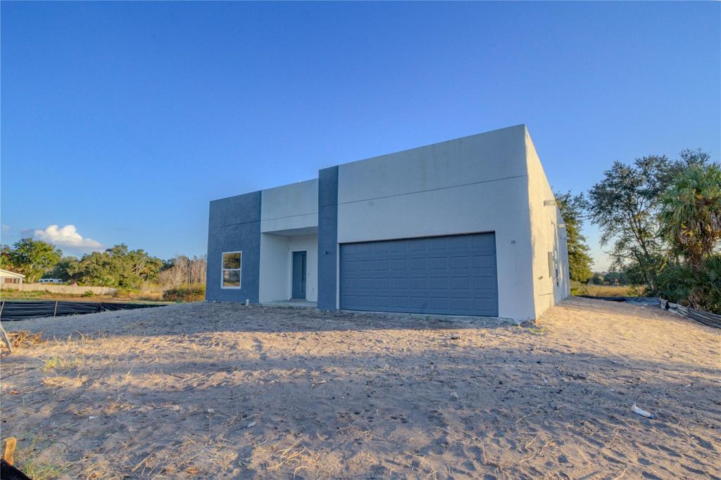 Photo of 397 North Boulevard W, Davenport, FL 33837 (MLS # O6372344)