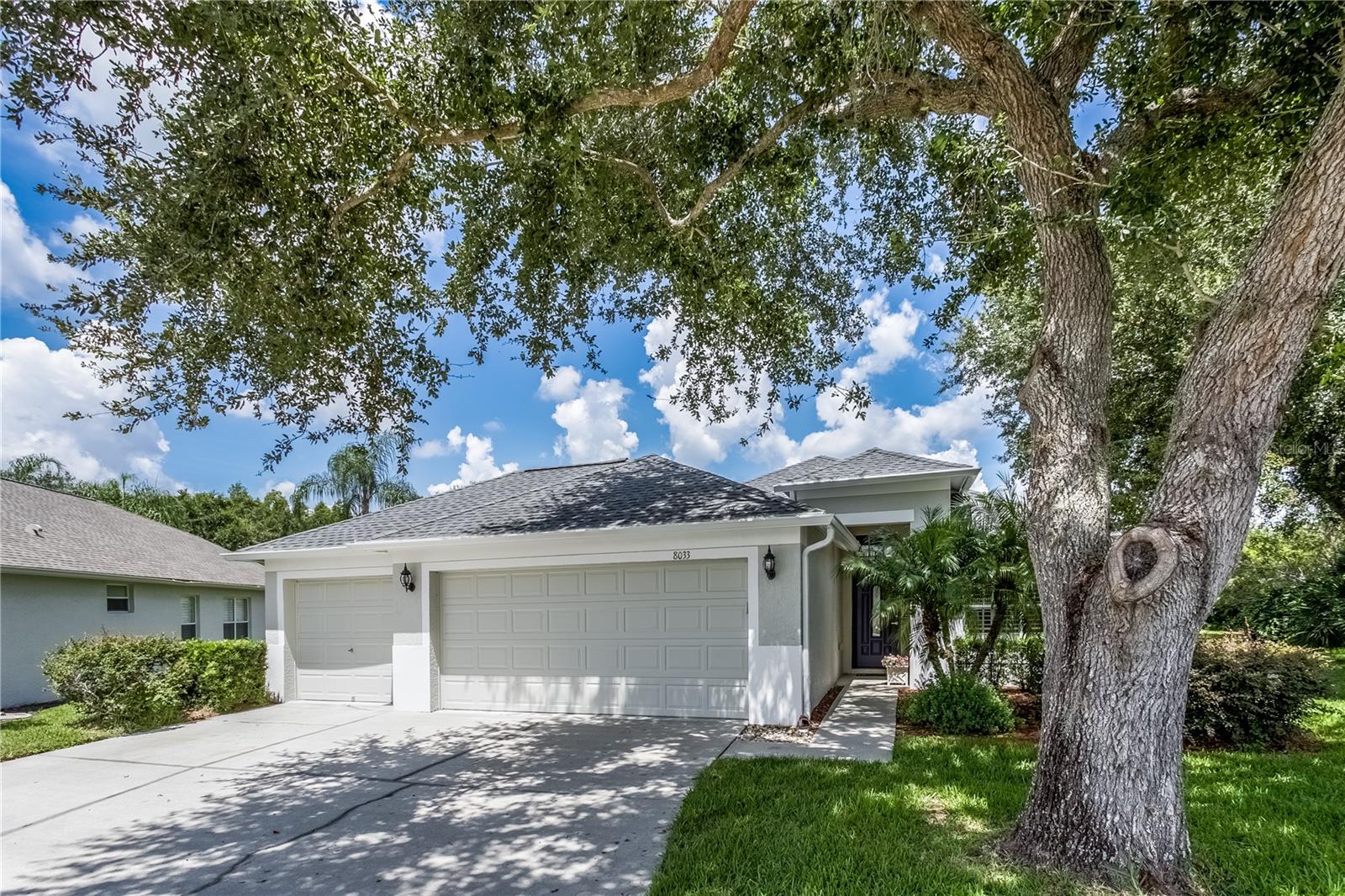 Beautifully updated Home on Oversized Lot in Popular 55+ Gated Golf Community
Welcome to this stunning 3-bedroom, 2-bathroom home located in a quiet cul-de-sac on a generous size lot—endless possibilities. The spacious 3-car garage offers plenty of room for vehicles, a golf cart, and storage.
Step inside and feel right at home with high ceilings, plantation shutters, modern laminate flooring and an open-concept layout that seamlessly connects the newly updated kitchen, with new cabinets with pull-out draws and elegant quartz countertops, dining room, and living area. Slide open the glass doors to reveal a large, fully screened-in lanai—all under roof—and yes, the jacuzzi is included!
The split bedroom layout offers privacy and comfort. The expansive primary suite is located at the rear of the home and features an en-suite bath with dual sinks, a walk-in shower, and a large walk-in closet. Two guest bedrooms are positioned at the front of the home, along with a full guest bath featuring a bathtub and single vanity. The indoor laundry room includes added storage cabinets for convenience.
This home is ideally situated near the clubhouse in a vibrant 55+ gated golf community offering an abundance of amenities:
• 18-hole golf course & driving range
• Resort-style pool area
• Fitness center
• Library & on-site restaurant
• Tennis, pickleball, bocce, shuffleboard
• Dog park
• Social & travel clubs, and much more!
HOA fee includes ROOF REPLACEMENT, EXTERIOR PAINT,CABLE TV, INTERNET AND LAWN MOWING. ROOF 2022, A/C 2021
Enjoy the convenience of nearby shopping, dining, and easy access to major highways leading to Tampa and the beautiful Gulf Coast beaches. Just outside the guard gate, you’ll find a Publix Plaza with restaurants, a bank, hair and nail salons, animal hospital and a pet groomer.
Don't miss this rare opportunity to own a beautifully updated home on an oversized lot in one of the area's most sought-after active adult communities!