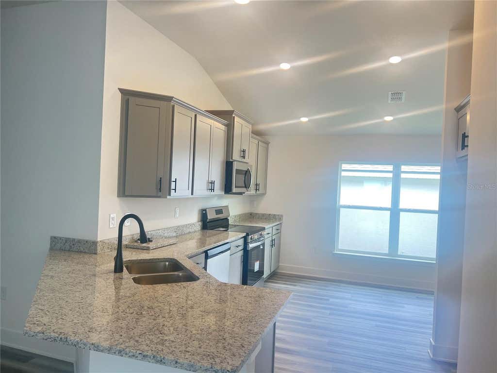 Photo of 12984 Kent Bradley Street, Dade City, FL 33525 (MLS # TB8493817)