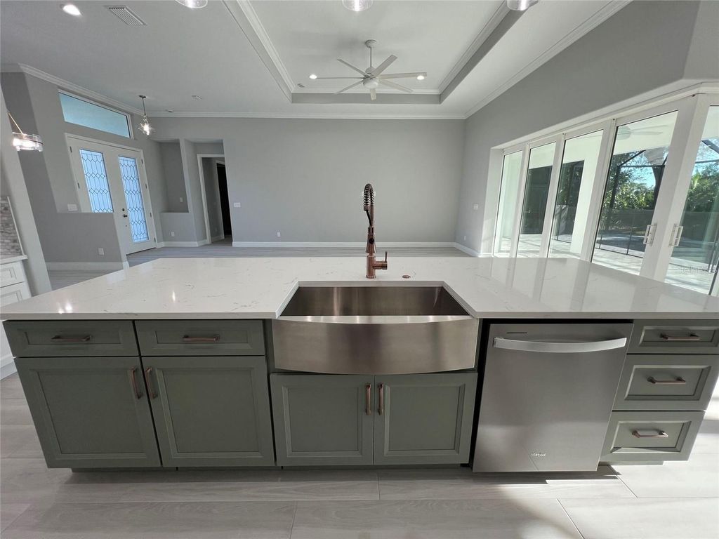 Photo of 750 Rotonda Circle, Rotonda West, FL 33947 (MLS # D6144576)