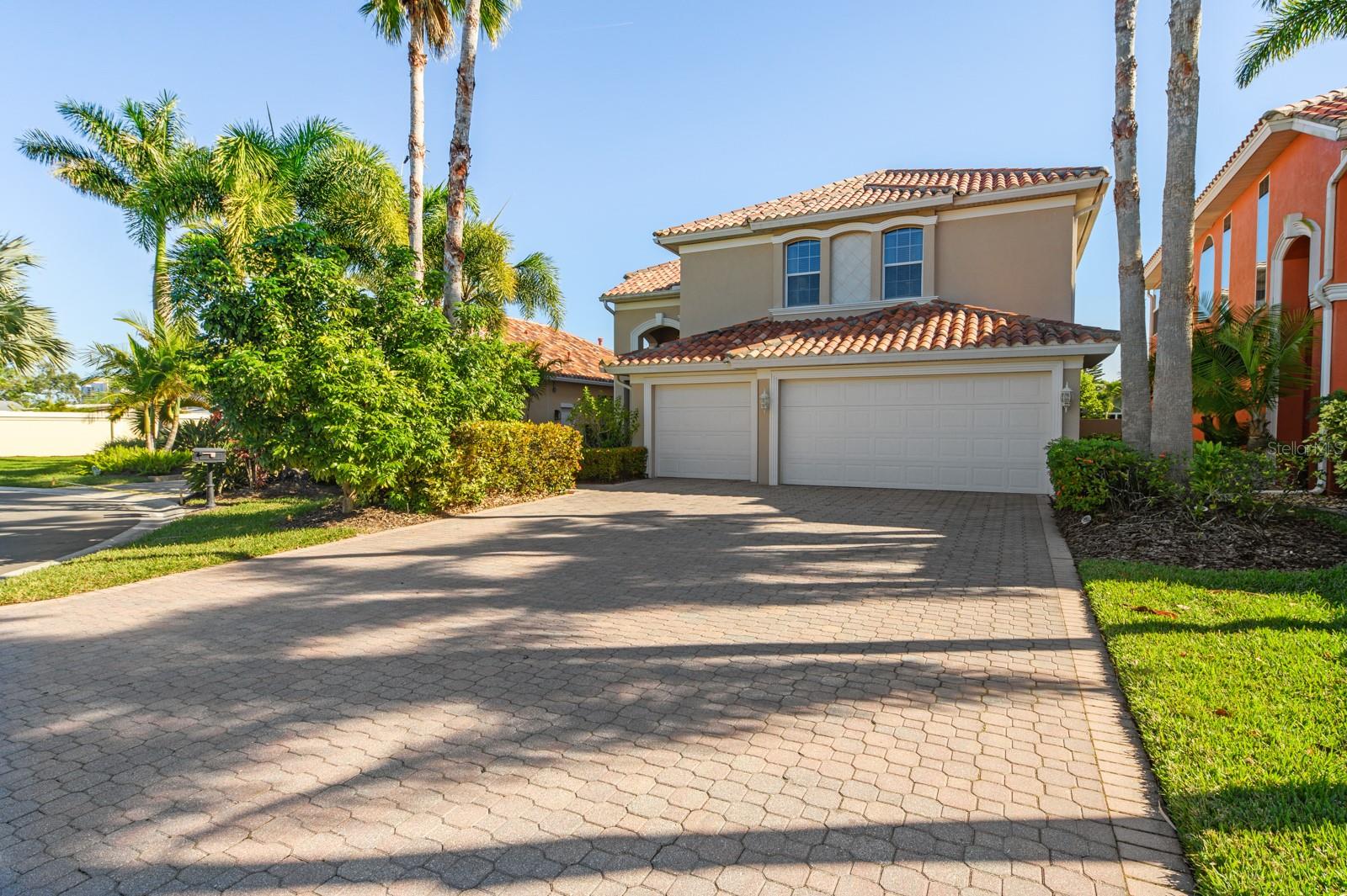 This home in Northshore at Riviera Dunes one of Florida's west coast premier boating communities. This vibrant community is not only ideal for mariners and anglers, and those that are seeking an active life style in a heaven-on-earth setting! Inside the gated community are the 154 distinctive neo-Mediterranean style single-family homes in the Homes of Riviera Dunes. This beautifully updated home is located in the Northshore section of Riviera Dunes, an established waterfront community. This 2 story, 3 car garage home is located on a pond with a quiet and peaceful setting. Step into the grand foyer that opens to formal dining and living rooms that overlook the screened lanai and water. Spacious and open kitchen and family room. The master suite has a double door entry, tray ceiling with private balcony, large walk-in closet and en suite bath. Take the "Cat Walk" which overlooks living, dining rooms and foyer to opposite side which contains 3 more bedrooms, 2nd bedroom has access to balcony and bath. The fifth bedroom and bath are on first floor. Kitchen cabinets recently updated with granite counters and walk-in pantry underneath stairs. Recessed lighting throughout, surround sounds in the family room and master bedroom. Recent updates also include an elevator and improved landscaping. Also available under a separate sale agreement a 40 FT boat slip in the deep-water full-service marina with a 16k lbs lift with access to the full-service Riviera Dunes marina. Open access to the Manatee River, easy access to the Gulf of Mexico, Tampa Bay or the Intracoastal Waterway. Our 18 foot deep man-made harbor is among the largest "hurricane protected" harbors in the state, offering residents private boat slips on neighborhood docks when available.