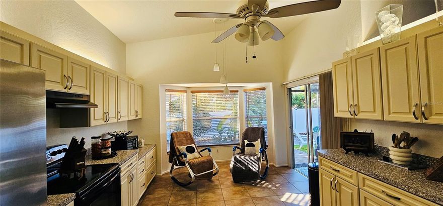 Welcome home to this charming and beautifully maintained 3-bedroom, 2-bath residence located on a great community.

Step inside to a spacious open floor plan featuring a generous great room, a dedicated dining area, and a large primary suite. Cathedral ceilings, pocket sliding doors, and fluid room transitions create an airy atmosphere perfect for easy living and entertaining.

The bright, eat-in kitchen offers abundant cabinetry and counter space, along with a new stainless-steel refrigerator (2024). The oversized primary bedroom features warm wood laminate flooring, a walk-in closet, a makeup vanity, and a lovely ensuite bathroom with a tiled walk-in shower.

The split floor plan ensures privacy for guests, with a separate bedroom and full bath. The third bedroom, with double doors, is ideal as a guest room, office, or den.

Outdoor living is a delight with a charming covered porch featuring a wood-slat ceiling overlooking a beautifully designed paver patio—perfect for relaxing or hosting friends and family.

Located just minutes from downtown Venice and Sarasota, you’ll enjoy world-class dining, beautiful beaches, and exceptional shopping.

Come see this wonderful home and make it yours—you will love living here!