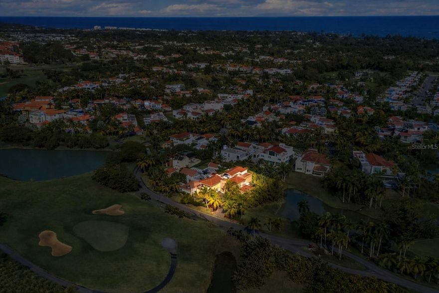 One or more photo(s) has been virtually staged. A rare dual-frontage residence within Dorado Beach East, positioned along both the golf course and lagoon, offering privacy, scale, and a distinctive sense of place within one of Puerto Rico’s most sought-after communities.

The home is defined by natural light, volume, and flow. Open living areas are balanced with more private, intentional spaces, creating a layout that supports both everyday living and extended stays. A custom Santos kitchen, paired with Sub-Zero and Wolf appliances, anchors the main level with a clean, functional design suited for both daily use and entertaining.

Upstairs, four en-suite bedrooms provide a private, hotel-style experience, with select bathrooms featuring steam showers. A flexible main-level suite with independent access adds versatility for guests, office use, or additional living space.

Outdoor areas are designed as a private retreat, with a lagoon-style pool, jacuzzi, and multiple terrace spaces that extend the living environment beyond the interiors.

Beyond its current condition, the property offers a rare level of infrastructure readiness — including generator configuration, cistern, solar integration capacity, and expansion potential — making it well suited for buyers planning long-term use or future enhancements.

Positioned minutes from the Dorado Beach Ritz-Carlton Reserve, golf courses, and private amenities, this residence offers a combination of privacy, preparedness, and location that is increasingly difficult to replicate.

A home designed to live comfortably today, with the flexibility to evolve over time.