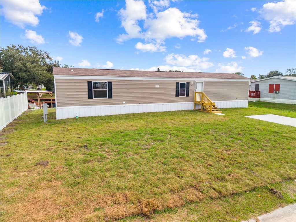 Photo of 411 Lagoon Court, Kenansville, FL 34739 (MLS # S5141121)