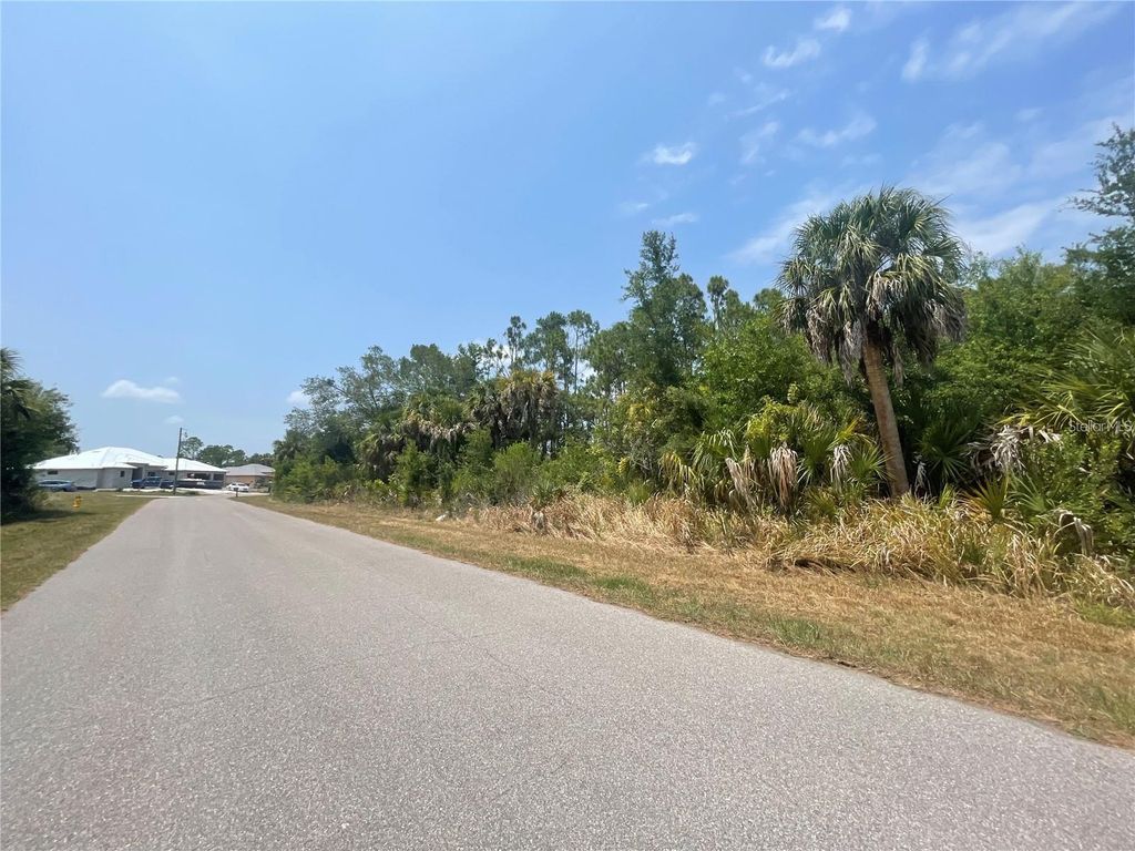 Photo of 356 Ramblewood Street, Port Charlotte, FL 33953 (MLS # O6424865)