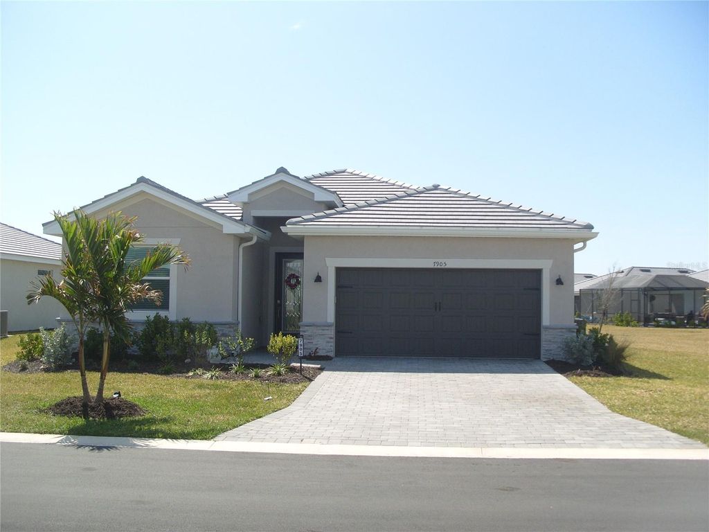 Photo of 7905 Lakes Edge Lane, Port Charlotte, FL 33981 (MLS # C7522679)