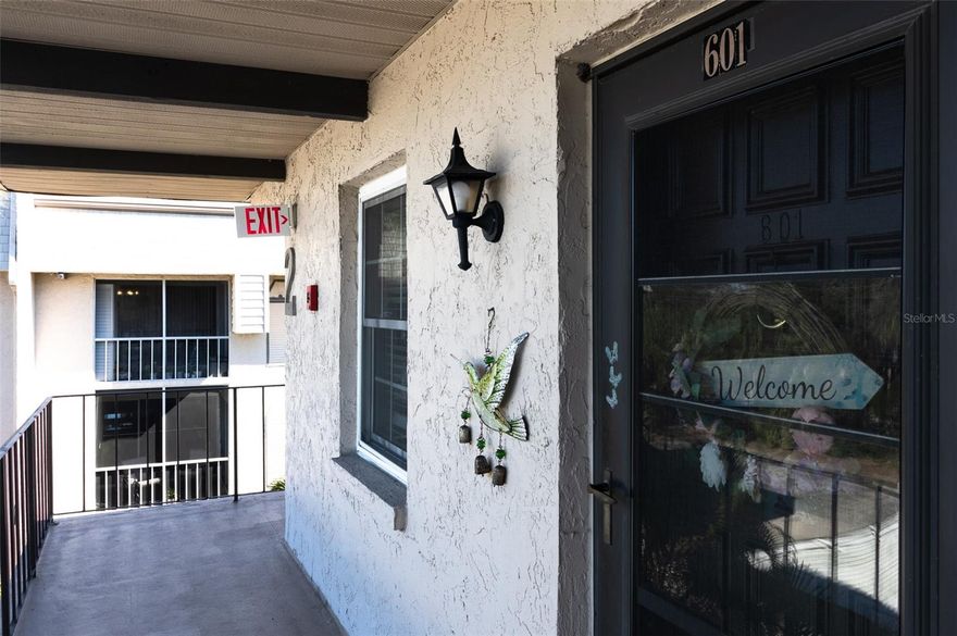 This beautifully updated third-floor, 2-bedroom, 2-bath corner unit is located in the highly desirable Cordova Green community of Bardmoor. Known for its well-maintained grounds and strong association, this community offers peace of mind and exceptional Florida living.  The residence features ceramic tile throughout, a solid-surface kitchen with abundant storage, all-wood cabinetry, and a convenient pass-through window—perfect for entertaining. The unit has been tastefully remodeled, including updated bathrooms, modern fixtures, and newer ceiling fans.  As a corner unit, enjoy added privacy and natural light, along with a screened-in balcony overlooking the pool area. The balcony also includes a storage and laundry closet, with a full-size washer and dryer included with the unit.   Community amenities include a pool and spa, and this unit comes with one covered carport parking space. The association allows one pet, welcomes all ages, and has no ownership restriction for leasing, making this an excellent primary residence, second home, or investment opportunity.  Location is everything, and this property delivers—just minutes from Bardmoor Promenade, shopping, dining, the YMCA, and the Bardmoor Health and Emergency Center. The association is financially sound with solid reserves, completed engineering reports, and all documents in place.  Come experience the best of Florida living in this exceptional Bardmoor condo!