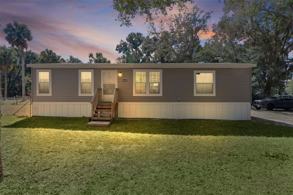 Photo of 16960 SE 115th Avenue, Weirsdale, FL 32195 (MLS # OM712716)