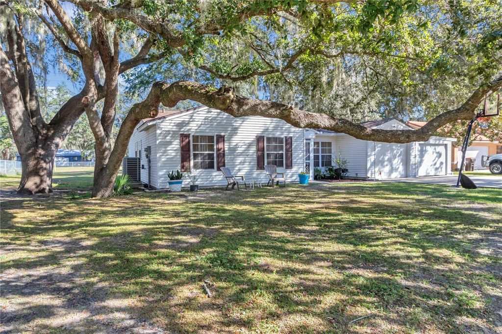 Photo of 303 Oak Track Pass, Ocala, FL 34472 (MLS # OM710637)