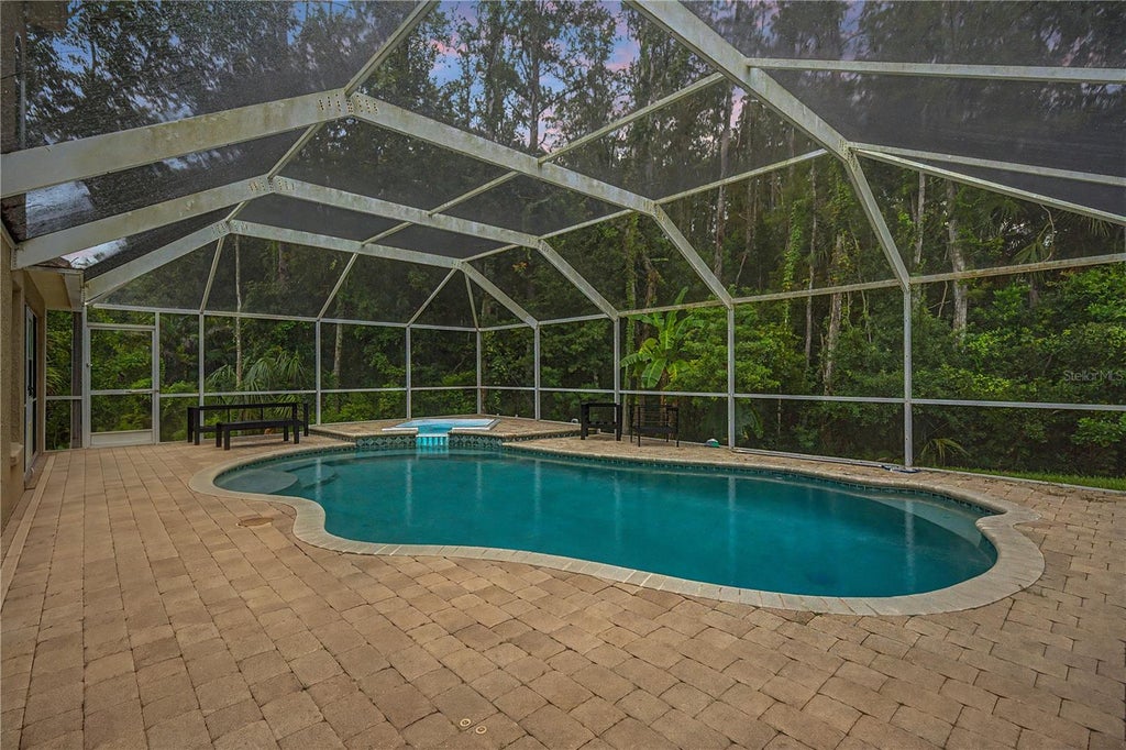 Photo of 212 Arbor Woods Circle, Oldsmar, FL 34677 (MLS # TB8546900)