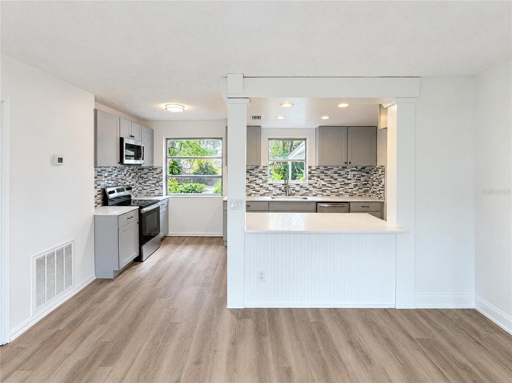 Photo of 7423 Nolton Way, Orlando, FL 32822 (MLS # O6454008)