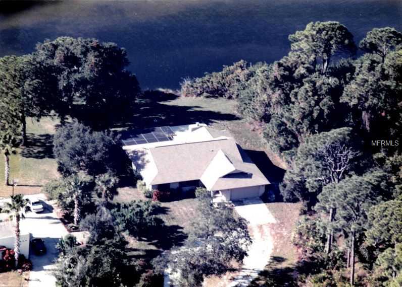 ONE ACRE IN ENGLEWOOD GARDENS ON THE WATER WITH A DOCK AND A CUTE TWO BEDROOM TWO BATH TWO CAR GARAGE RESIDENCE. POOL AND DECK AREA RECENTLY REDONE.HOME HAS GREAT POTENTIAL AND LOCATION. BAY VIEW FROM THE KITCHEN AND WONDERFUL SUNSETS.