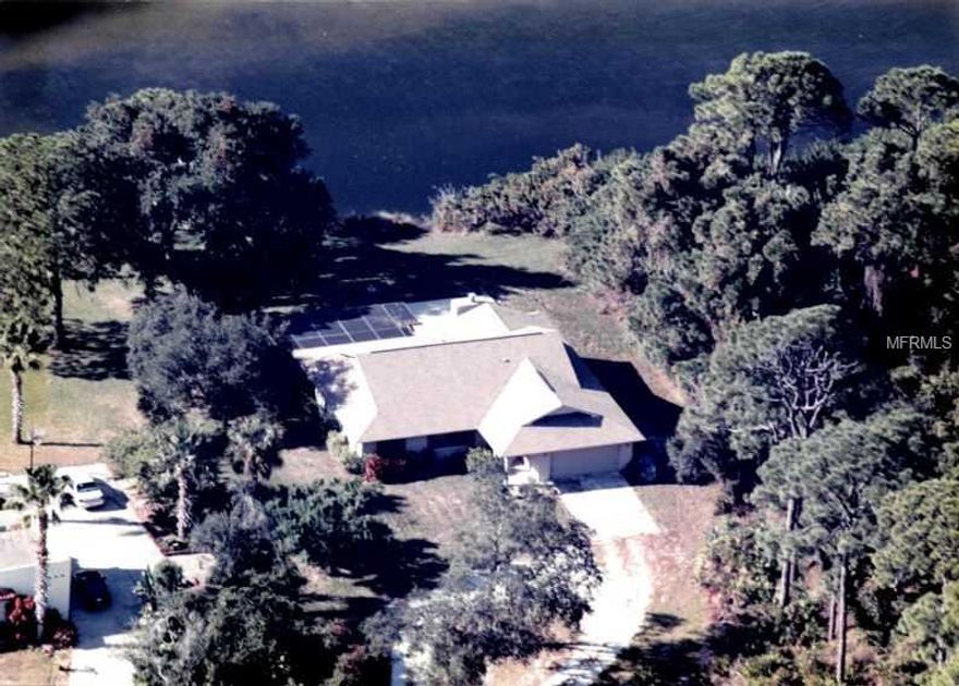 ONE ACRE IN ENGLEWOOD GARDENS ON THE WATER WITH A DOCK AND A CUTE TWO BEDROOM TWO BATH TWO CAR GARAGE RESIDENCE. POOL AND DECK AREA RECENTLY REDONE.HOME HAS GREAT POTENTIAL AND LOCATION. BAY VIEW FROM THE KITCHEN AND WONDERFUL SUNSETS.