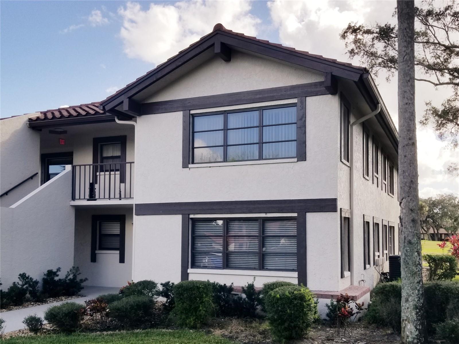 Welcome home! This rarely available oversized ground floor condo is tastefully TURNKEY furnished and boasts a terrific view of Palm Aire Golf and Country Club's premier course. This spacious end unit has big bright windows all down the side. It features two beautifully renovated bathrooms with multiple closets throughout the home. It boasts and an updated kitchen with pantry storage, Corian countertops, wood cabinets and a custom home office. Newer laundry with storage in the unit! The main suite features a walk in closet, an oversized closet and a newly updated main en suite bathroom. The second bedroom also boasts an updated bath and ample closet space. The third bedroom is decorated as a den, with a privacy door and closet for use as bedroom. The living room, dining room and kitchen all look toward the golf course. This stunning home boasts new A/C and Hot Water heater. EXCELLENT EXECUTIVE RENTAL INCOME HISTORY! It works perfectly for fulltime residents, snowbirds or investors. This Palm Aire Country Club community has a heated pool with a club room, shuffleboard and other activities. Optional memberships are available at Palm Aire Country Club. Palm Aire feature 36 holes of championship golf, tennis, pickleball, fitness, dinning and many clubs / groups. There is terrific access to UTC and downtown arts, culture and shopping. The beaches are a short drive away! You're right in the center of everything!
