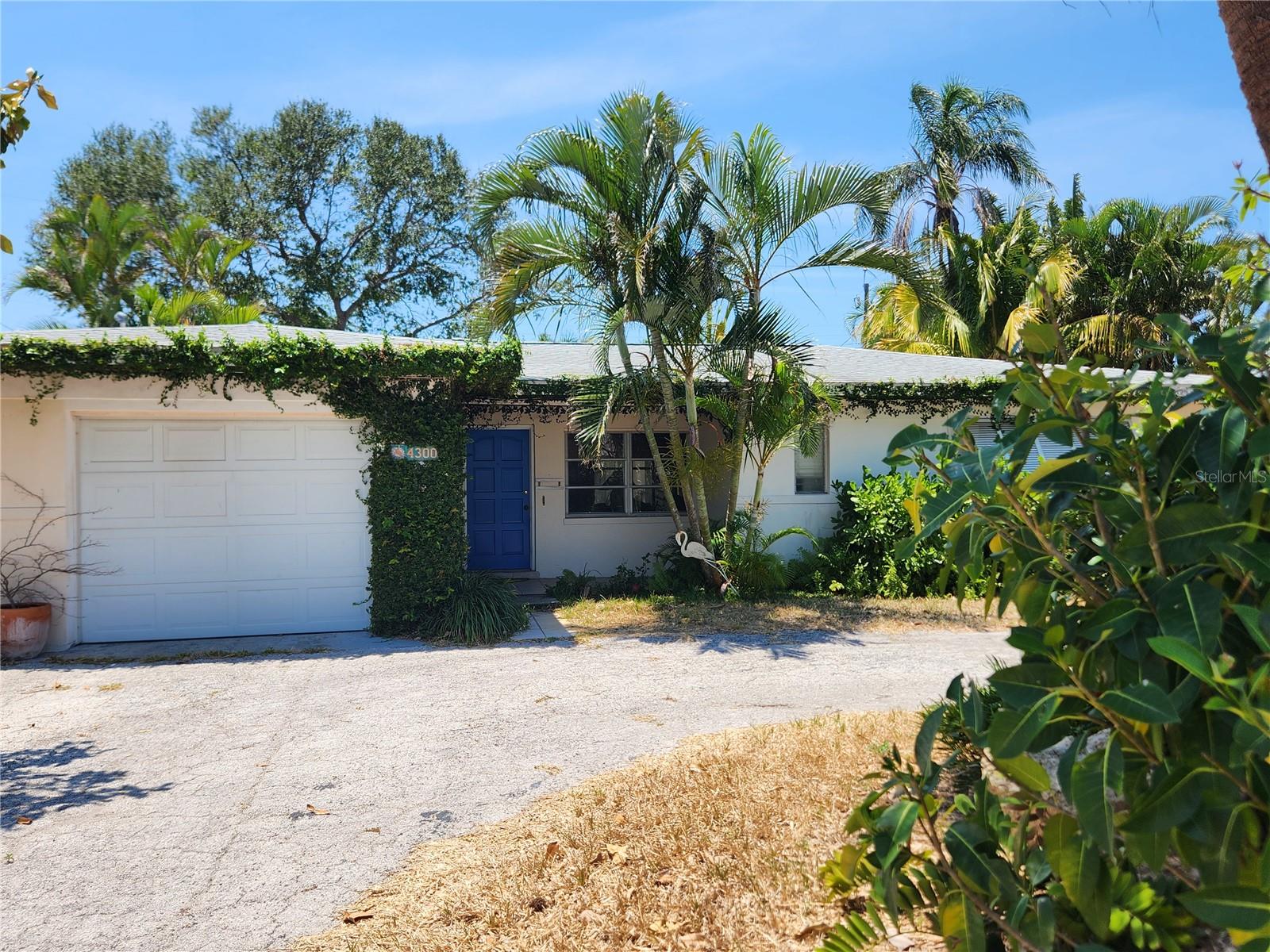 Here is a 3 bedroom and 3 bath house ready for improvements. Master has a fireplace in it and a large bathroom with room for a sauna. The other two bedrooms or in the front of the house and one has an attached bath to it. Pool outside does need a bit of work to it. Has a one car garage. Great house on the beach with the availability to walk to restaurants shops and grocery store.