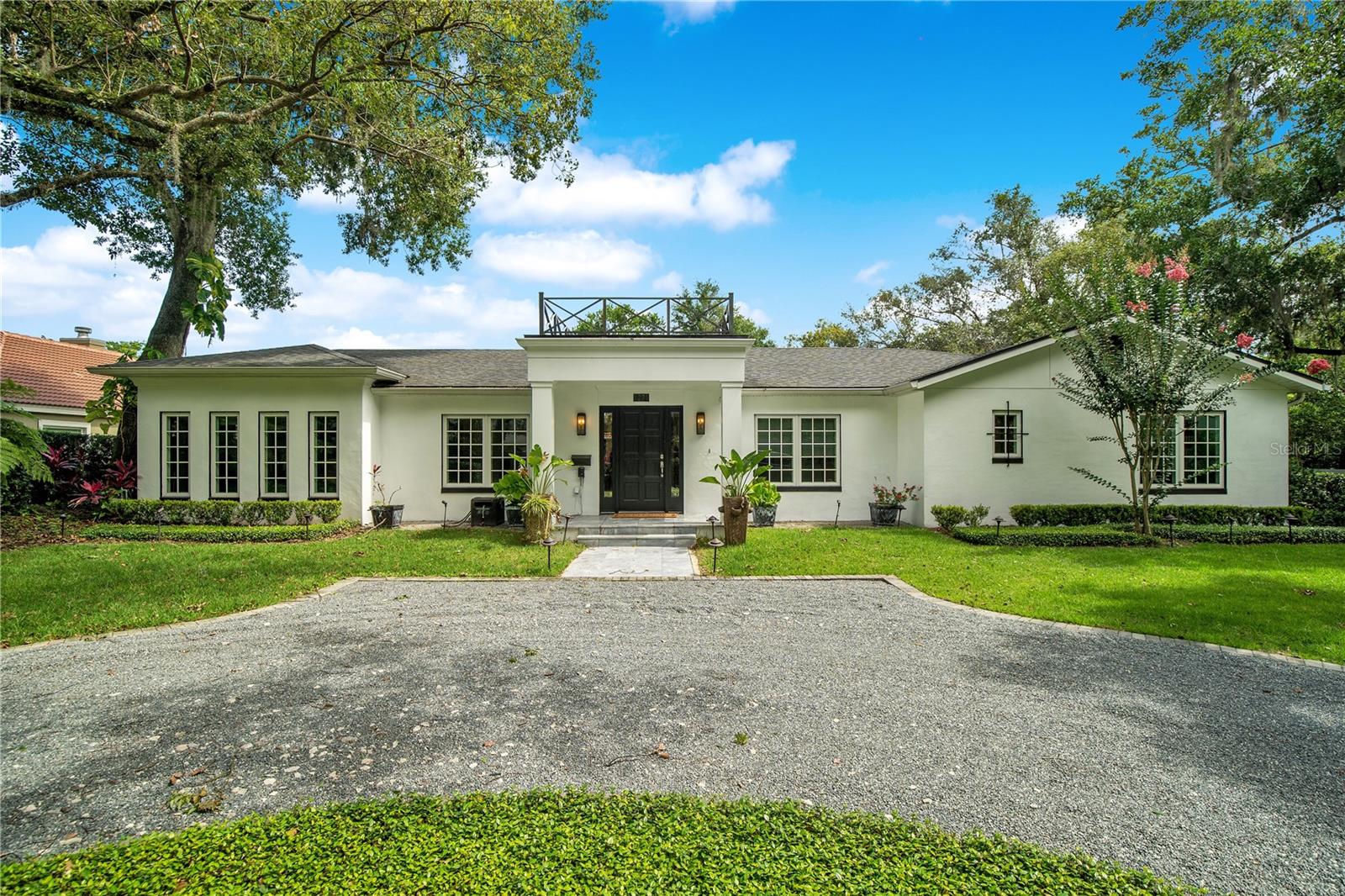 Under contract-accepting backup offers. Take a look at this rare opportunity to own this unique chic and trendy residence poised on a large corner lot with mature landscaping. You will be amazed at this fully remodeled single-story home with 4 bedrooms, 4.5 Baths plus an office and a pool. The open floorplan offers the ultimate comfort for today’s modern living and entertaining indoor & outdoor with its well-designed rooms with plenty of natural daylight. Notice the exquisite finishes and fixtures throughout the gorgeous custom kitchen and baths. The chef's kitchen is fully equipped with stainless steel appliances, gas range, vented hood, solid wood cabinets, wine refrigerator, and granite counter tops with breakfast bar seating. Stunning master suite with a luxurious bath and a large walk-in closet with built-ins. Secondary en-suite bedrooms are spacious with their own closets and updated bathrooms. You have plenty of parking space by the large half circular driveway at the front plus a 2-car garage in the rear with additional parking pads. You will feel like you are on vacation when stepping out through the French doors leading to your private pool oasis with a deck perfect for sunbathing. The backyard was designed for entertaining and gathering for enjoying the beautiful Florida weather. This fantastic location on highly sought after Palmer Avenue is within close proximity of downtown Park Avenue, shopping, restaurants, Phelps Park, and Rollins College. Don’t miss out on this extraordinary property. Be sure to click on the virtual tour links.
<iframe width='853' height='480' src=https://my.matterport.com/show/?m=RwvkRzBtdks&mls=1
></iframe>