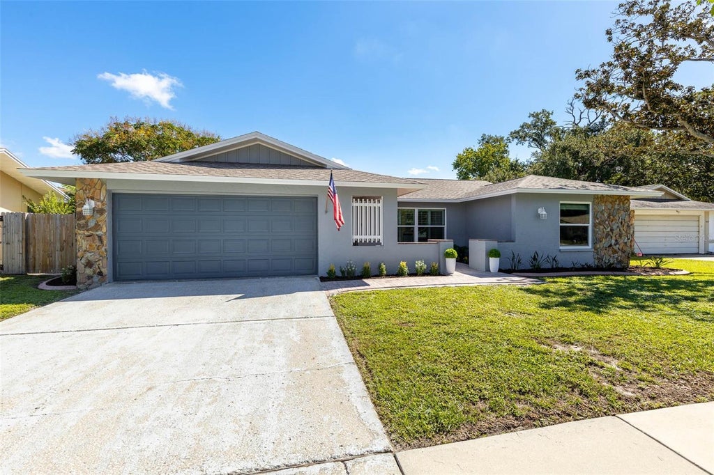 Photo of 3427 Glossy Ibis Ct, Palm Harbor, FL 34683 (MLS # TB8559159)