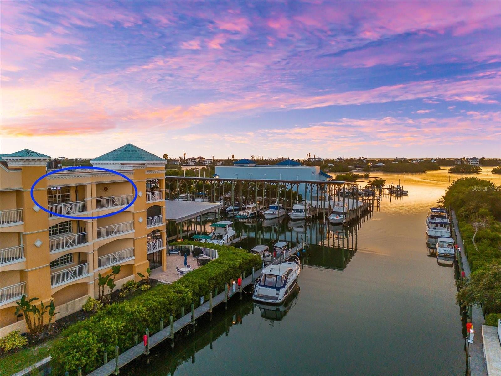 Annual turn-key furnished rental opportunity at Osprey Harbor Village, a gated waterfront community along Florida’s Intracoastal Waterway. This 3 bedroom, 2 bath penthouse offers nearly 2,000 square feet of living space plus a 290 square foot tiled terrace with sweeping views of the marina, Intracoastal, and Sarasota Bay. Soaring ceilings, an open floor plan, and walls of windows fill the residence with natural light. The split bedroom layout provides privacy, while the primary suite features water views, a large walk-in closet, walk-in shower, and jetted spa tub. Upscale finishes include travertine and ceramic tile floors, crown molding, granite counters, solid wood cabinetry, and stainless appliances. Two deeded indoor garage spaces, private storage, and impact windows are included. Amenities include a heated pool, two spas, fitness center, sauna, steam rooms, clubhouse with kitchen and lounge, and secure bike and kayak storage. Located between Sarasota and Venice, this prime waterfront location offers easy access to Siesta Key, Casey Key, Nokomis Beach, the Legacy Trail, waterfront dining, and boutique shopping. Available for annual lease, fully furnished, and move-in ready.