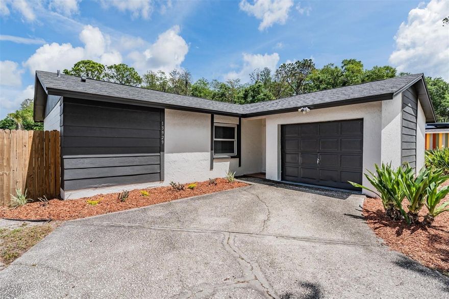 Welcome to this 3-bedroom, 2-bathroom home with a 1-car garage in desirable Carrollwood Meadows. The home features a huge fenced backyard and large screened-in porch, perfect for relaxing or entertaining. Inside, the open living and dining area provides a bright, comfortable layout with sliding glass doors leading to the patio. The galley-style kitchen includes white cabinetry, solid surface countertops, a tile backsplash, and stainless steel appliances.
All newer windows and the sliding glass door were replaced in 2018, offering added efficiency and peace of mind.
The home offers a split-bedroom floor plan, with the primary suite privately located on one side and two additional bedrooms on the opposite side. The primary bedroom features a large walk-in closet, and all bedroom closets include beautiful built-ins for added storage and organization.
Enjoy community amenities including a park, tennis and basketball courts, ball fields, and neighborhood events. Conveniently located near Citrus Park Mall, the Upper Tampa Bay Trail, the Veterans Expressway, Tampa International Airport, and downtown Tampa.