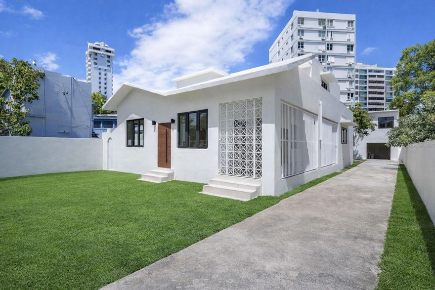 One or more photo(s) has been virtually staged. Looking for a versatile property in Condado with strong income potential? This fully renovated multi-unit property offers an excellent opportunity for short-term rentals (Airbnb) and/or the potential for commercial use.

Situated on a 596-square-meter lot with approximately 3,058 square feet of gross living area, the property features a total of 7 bedrooms and 5 bathrooms across four (4) separate units, divided between a main house and a rear structure—each with two levels.

Main House:
    •    First Level: 3 bedrooms, 2 bathrooms
    •    Second Level: 2 bedrooms, 1 bathroom
Rear Structure:
    •    First Level: 1 bedroom, 1 bathroom
    •    Second Level: Studio with 1 bathroom
    •    
The property has just undergone a complete renovation, including new flooring, windows, updated electrical and plumbing systems, and new A/C units.

The spacious lot offers excellent outdoor potential, with room to create a custom patio, pool, lounge area, or garden. The main house also features a covered porch on the first level and a large terrace on the second level, seamlessly blending indoor and outdoor living.

Ideally located in the heart of Condado, the property offers excellent visibility and accessibility, with close proximity to major tourism hubs, the beach, supermarkets, restaurants, hotels, and more.

Additional features include a covered carport for one vehicle and extra parking space in the driveway. This property is sure to move very quickly.