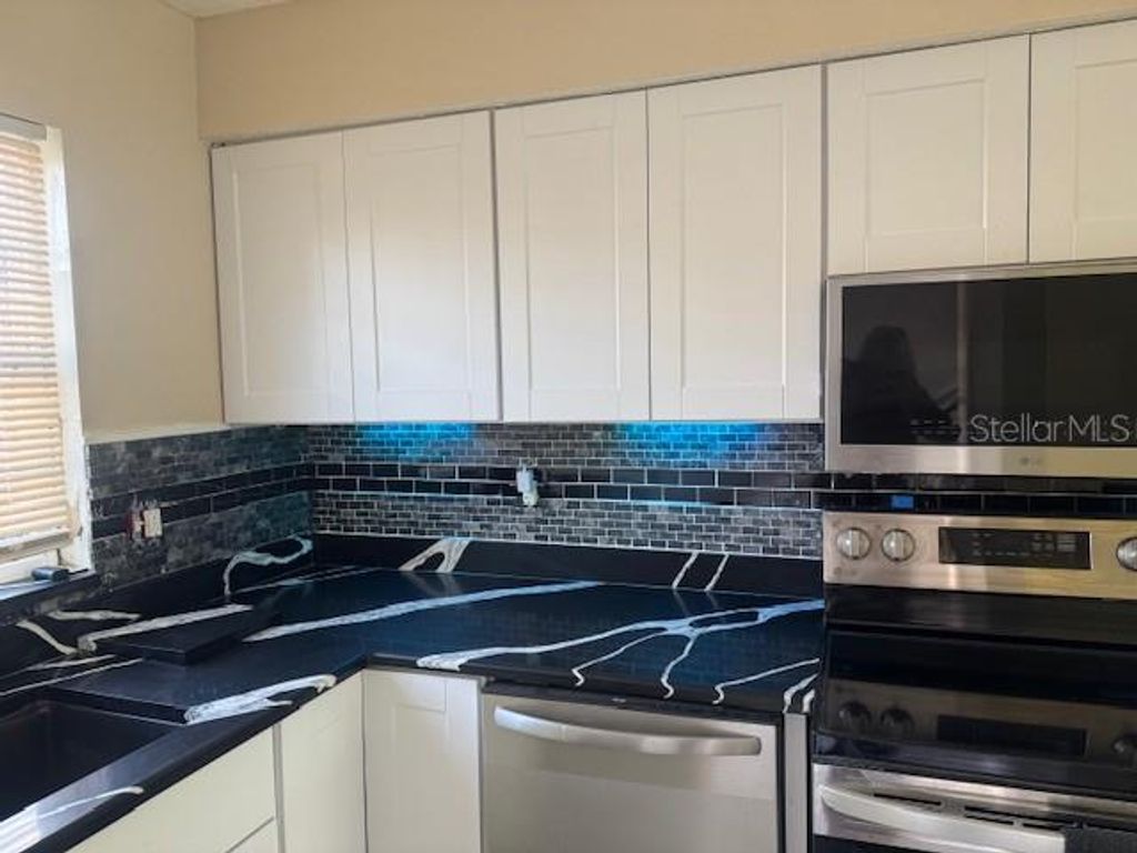 Photo of 1920 Edgewood Dr E #O1, Lakeland, FL 33803 (MLS # P4937621)