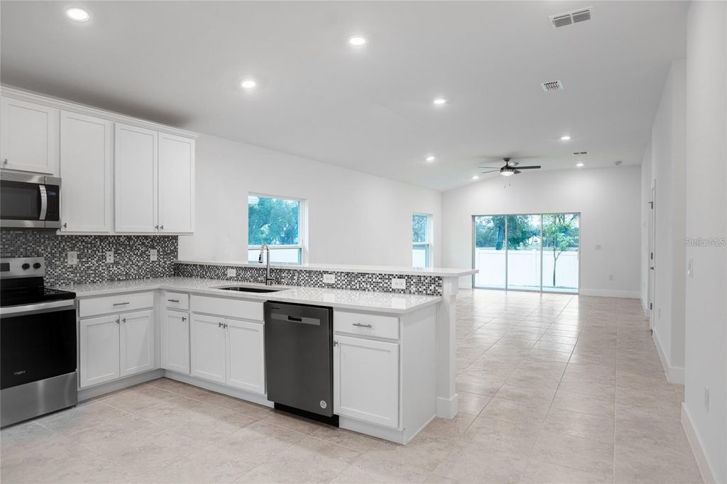 Photo of 528 Rose Apple Circle, Port Charlotte, FL 33954 (MLS # TB8429604)