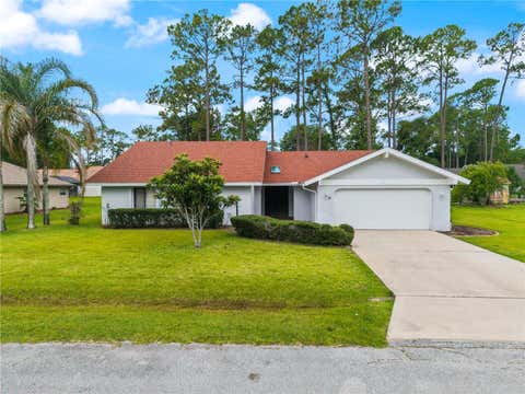 Photo of 10 Village Lane, Palm Coast, FL 32164 (MLS # FC319611)