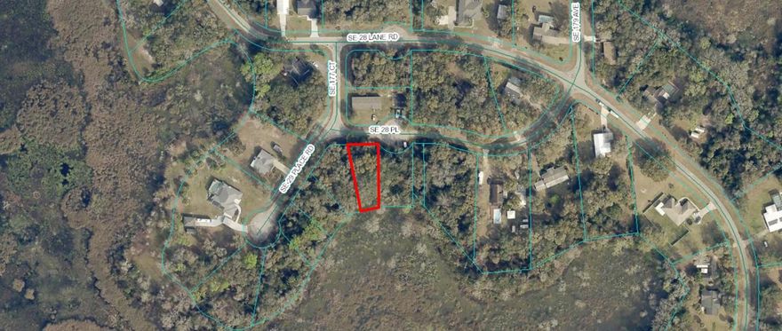 LOCATED IN LOVELY SILVER SPRINGS WOODS. WONDERFUL LOT ON A PAVED STREET, HIGH AND DRY WHERE THE HOME WILL GO. ON NORTH LAKE BRYANT. AWAY FROM CITY AND MIXED USE. MOBILES OR SITE BUILT HOMES OK.