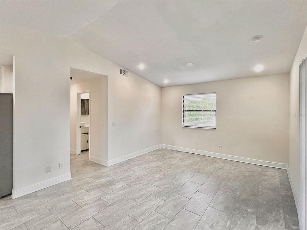 Photo of 3022 W Frierson Avenue, Tampa, FL 33614 (MLS # O6347949)