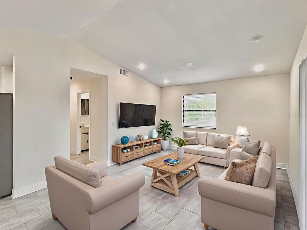 Photo of 3022 W Frierson Avenue, Tampa, FL 33614 (MLS # O6347949)