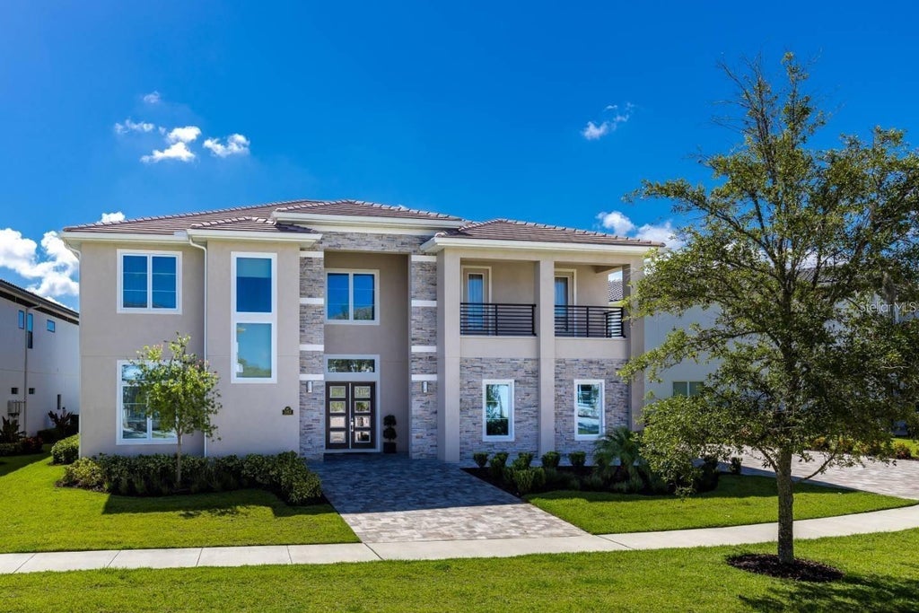 Photo of 1063 Jack Nicklaus Court, Kissimmee, FL 34747 (MLS # O6443321)