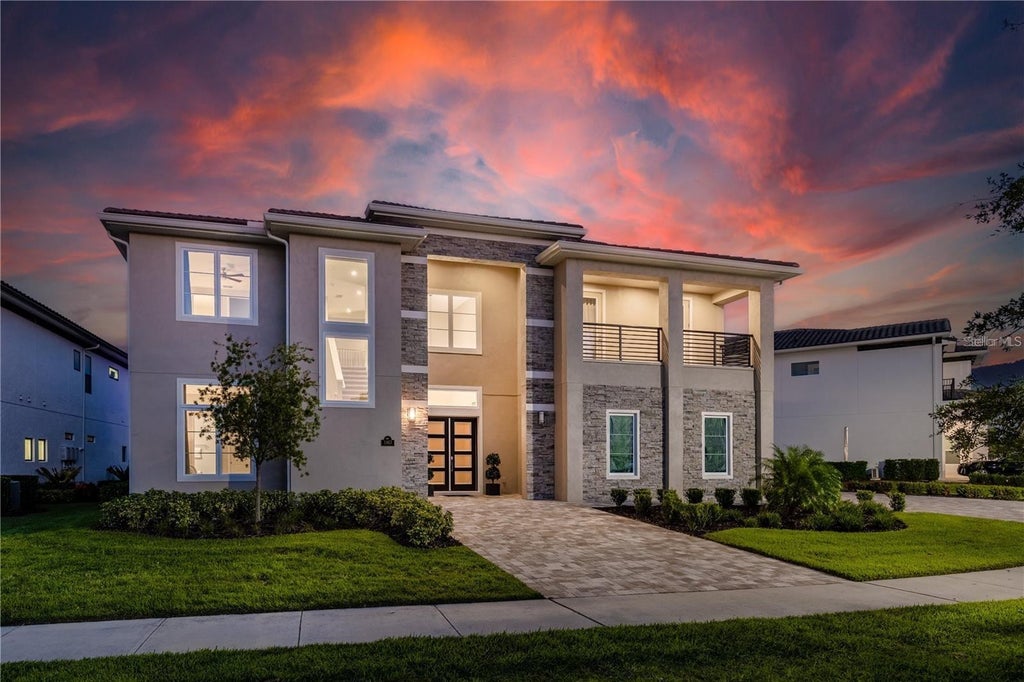 Photo of 1063 Jack Nicklaus Court, Kissimmee, FL 34747 (MLS # O6443321)