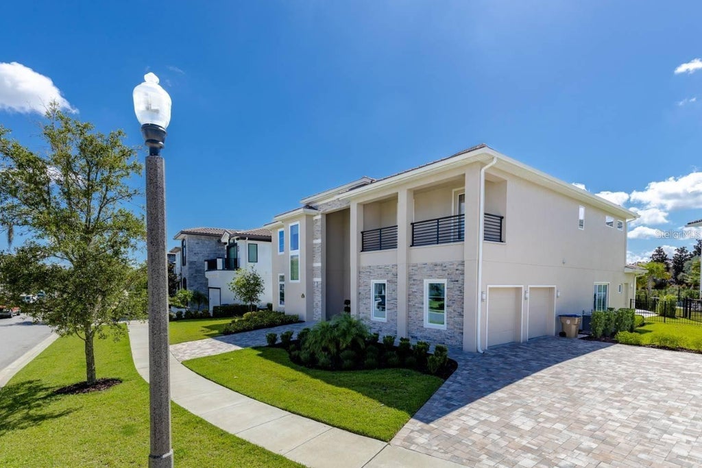 Photo of 1063 Jack Nicklaus Court, Kissimmee, FL 34747 (MLS # O6443321)