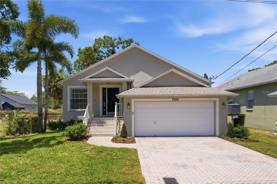 Just minutes from MacDill Air Force base, you will find this beautifully maintained 3-bedroom, 2-bathroom single-family home with a brand-NEW ROOF, ideally situated on a quiet dead-end street with no through traffic and NO HOA! The elevated BLOCK construction offers peace of mind, with no history of flooding * Step inside to a bright, open layout filled with natural light through screened windows, complemented by hardwood flooring in the living room (2019) and fresh interior and exterior paint completed late 2025 * The kitchen and spacious living spaces flow seamlessly to the outdoors through elegant French doors, leading to a fully screened-in back patio with an outdoor fan that provides additional comfort year-round * The fenced backyard and established landscaping create an enjoyable outdoor setting * The primary suite offers a comfortable retreat, featuring an updated ensuite bathroom with stone countertops, a NEW double vanity, a separate garden tub and brand NEW separate shower * The second bathroom has been updated with a brand-new sink and faucet * This home has been thoughtfully upgraded with major systems already taken care of, including a new roof (January 2026) and a NEW HVAC system (June 2025), providing long-term value and peace of mind * The HVAC thermostat and garage door opener are WiFi capable, offering modern smart-home convenience * Additional highlights include a 2-car garage; fully finished with wire shelving, storage hooks, a sealed floor, it has been freshly painted, creating a clean and highly functional space * The expansive paver driveway offers ample parking * Street light coverage enhance visibility over the driveway and front yard, adding an extra layer of comfort and safety * Located in a desirable South Tampa area with easy access to the Air Force Base, shopping, dining and restaurants, Picnic Island Park with its beach and dog park, this move-in ready home combines comfort, updates, and location. *Living room TV conveys; fiber optic connection in place. *Security system in place and ready for activation by new owner if desired * Schedule your showing today!