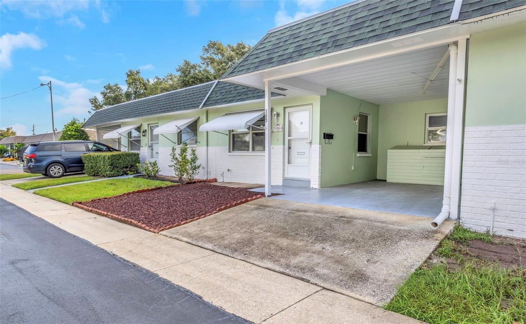 Photo of 165 Sky Loch Drive E, Dunedin, FL 34698 (MLS # TB8551846)