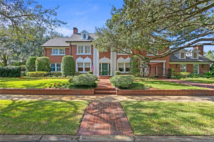 Introducing a timeless 1926 traditional red brick home in the prestigious Tampa Golf View neighborhood. Set on a sprawling half-acre lot, the main residence and carriage house exude classic charm boasting an interior with 6 bedrooms, 5 full bathrooms and 2 half bathrooms in over 6500 square feet.  Inside, there is a perfect blend of modern amenities and timeless craftsmanship. The kitchen features an oversized island with a solid walnut top, Carrera marble counter tops and backsplash, Sub Zero refrigerator, 2 Bosch dishwashers, Wolfe 6 burner gas range and double oven, Dacor warming drawer, and an abundance of solid wood cabinetry.  The adjacent open breakfast room has French Doors out to the backyard and is surrounded by windows and a custom skylight offering natural light from all directions.  The mud room has plenty of locker space, a half bathroom, and a walk-in utility room.  The Great Room features French Doors to the backyard, space for a game table, wet bar equipped with a beverage center/ice machine/sink, a half bathroom.  A unique touch to the wine cellar is the flooring from the Tampa Cigar Factory.  The Flex Room downstairs (currently used as an office) features a fireplace.  The Living Room and Dining Room sit across from each other in the front of the house and is a welcome space for entertaining family or friends.  The staircase is accessible from the front entry or the kitchen.  All the bedrooms are large with great closet space.  The Primary Bedroom is elegant featuring rich wood floors, a cozy fireplace, and a spacious walk-in closet with beverage center.  The Primary bathroom is a luxurious retreat with pristine marble floors, Daycor Towel Warmer, ample storage, standalone bathtub, and a steam shower for indulgent relaxation.  The remaining bedrooms include one with a bathroom and cathedral ceilings, two bedrooms share a jack and jill bathroom with private toilet and shower and the remaining two bedrooms share a large private hall bathroom.  The Laundry Room includes double Electra Lux washers and dryers, a built in ironing board, sink and beverage center. One of the standout features of this estate is the separate 756 square foot Carriage House with cathedral ceilings, a full bathroom and kitchenette and a generator if needed. The inground heated and saltwater pool and spa, firepit and new Alfresco built in grille promise endless enjoyment.  The spacious 3-car garage provides ample space for your vehicles and storage needs along with a garden storeroom.  This property's prime location on an oversized lot in the coveted Tampa Golf View neighborhood ensures a lifestyle of exclusivity and convenience. Here, you'll enjoy serene surroundings, top-rated schools, and easy access to all the amenities Tampa has to offer.