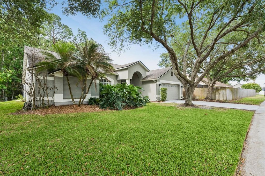 Photo of 1023 W Riviera Boulevard, Oviedo, FL 32765 (MLS # O6400935)